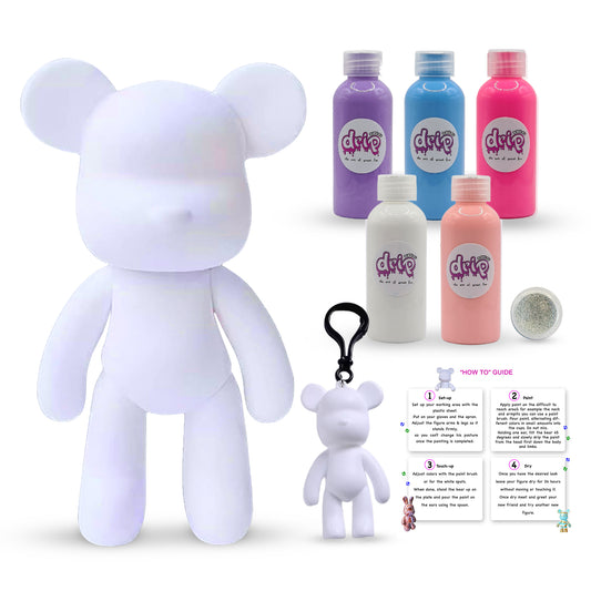 Bear Piggy Bank Kit – 33 cm “Cotton Candy” DIY acrylic flow set with shimmering silver accent; includes 33 cm bear piggy-bank figurine, five 60 ml acrylic paints (purple, light-blue, fluorescent-pink, white, light-pink), glitter, apron, gloves, table sheet, clear cups, plate, pipette, spoon, and paintbrush—ideal for quick, mess-free creative fun and as a memorable gift for Ramadan, Eid, birthdays, or baby showers.
