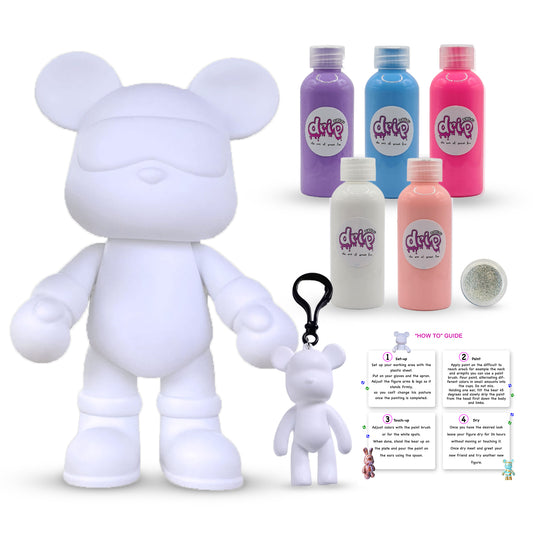 “Cool Bear Piggy Bank Kit – 33 cm ‘Cotton Candy’ DIY acrylic pour set with shimmering silver accents; includes 33 cm bear piggy‑bank figure, five 60 ml acrylic paints (Purple, Light-Blue, Fluorescent-Pink, White, Light-Pink), glitter for sparkling finishes, plus apron, gloves, table sheet, clear cups, plate, pipette, spoon, and paintbrush—ideal for quick, mess‑free creative fun and thoughtful gifting for Ramadan, Eid, birthdays, housewarmings, gender reveals, or baby showers.”