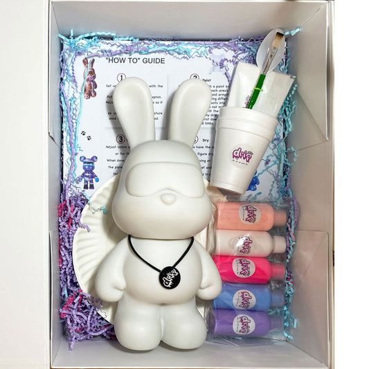 Blank bunny mold sculpture made of PVC, prepared for use in acrylic flow pouring paint arts and crafts workshops. The smooth, unpainted surface is ideal for creating colorful, fluid designs, encouraging creativity and hands-on artistic expression