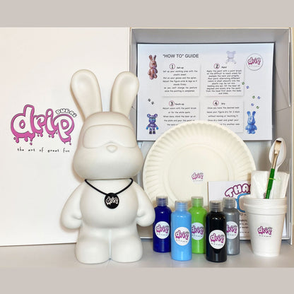 Experience the thrill of creating your own unique cute art masterpiece using dynamic and mesmerizing fluid paint techniques on figurines. This image captures the fusion of creativity and fun, showcasing colorful artworks that inspire joy and artistic expression!