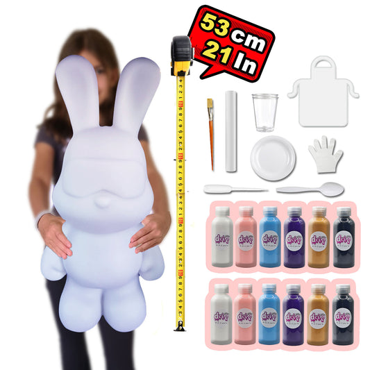 Cool Bunny Piggy Bank Kit – 53 cm “Glitter Galaxy” DIY acrylic pour set with shimmering silver accent; includes large bunny piggy-bank figure, 12 × 60 ml acrylic paints (White, Light-Pink, Light-Blue, Dark-Purple, Gold, Black), glitter for sparkling finishes, plus apron, gloves, table sheet, clear cups, plate, pipette, spoon, and paintbrush for mess-free creative fun and gifting.
